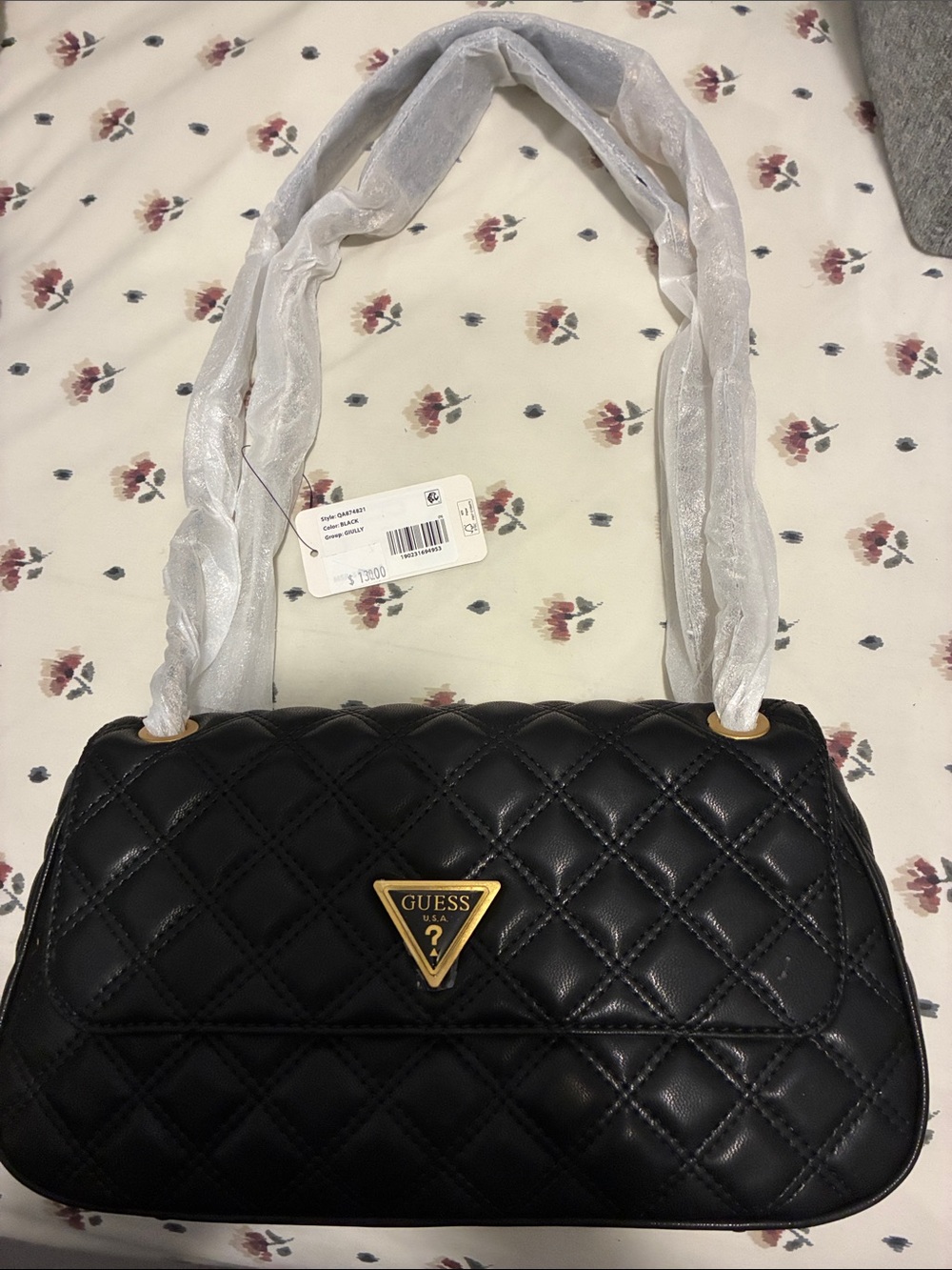 GUESS Black Quilted Shoulder Bag with Gold Triangle Logo